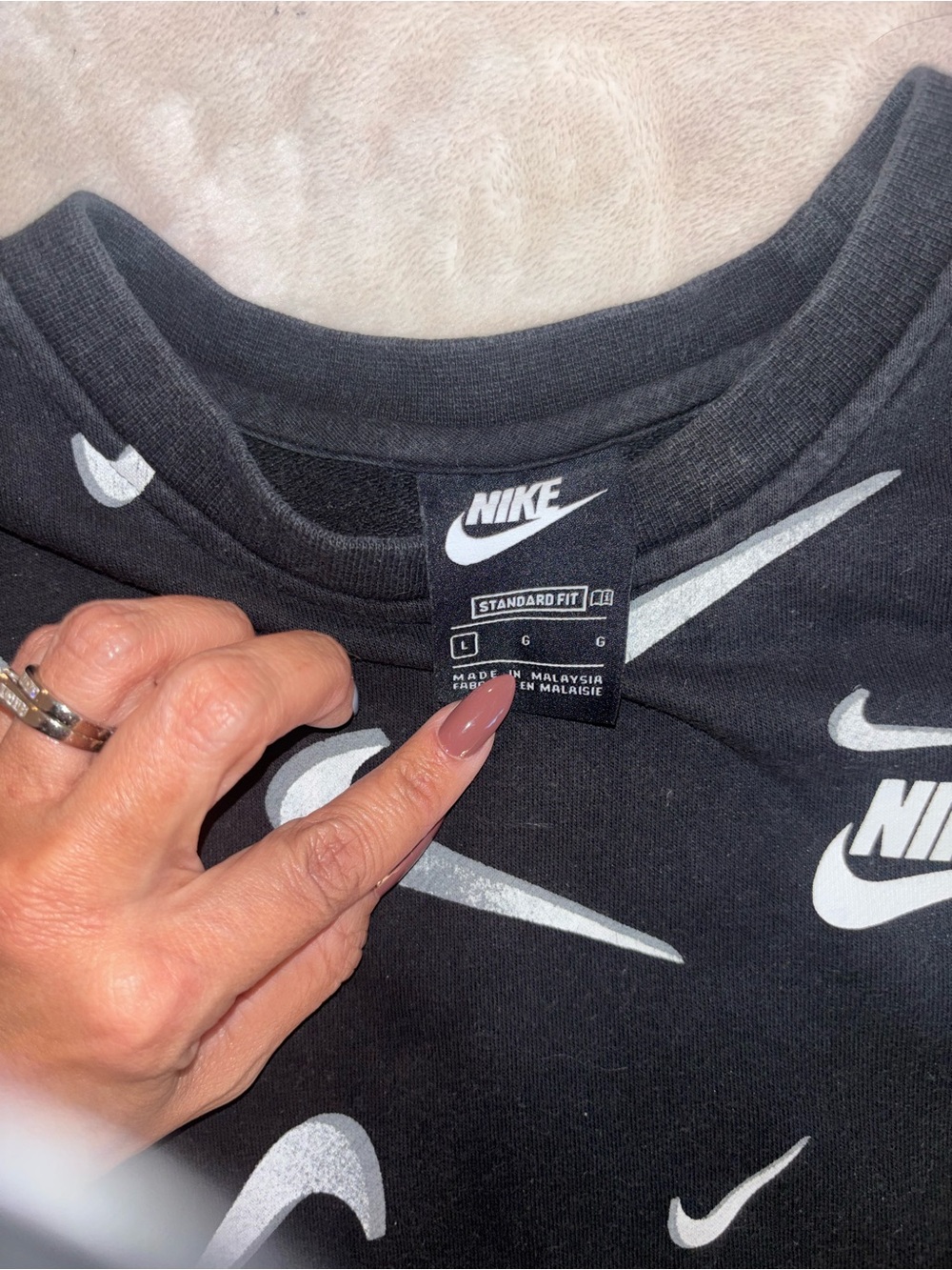 Nike Women's Black All-Over Swoosh Sweatshirt